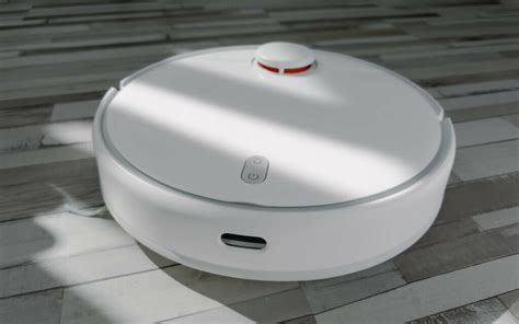 Этапы очистки сборника пыли робота от Xiaomi Mi Robot Vacuum Mop Essential